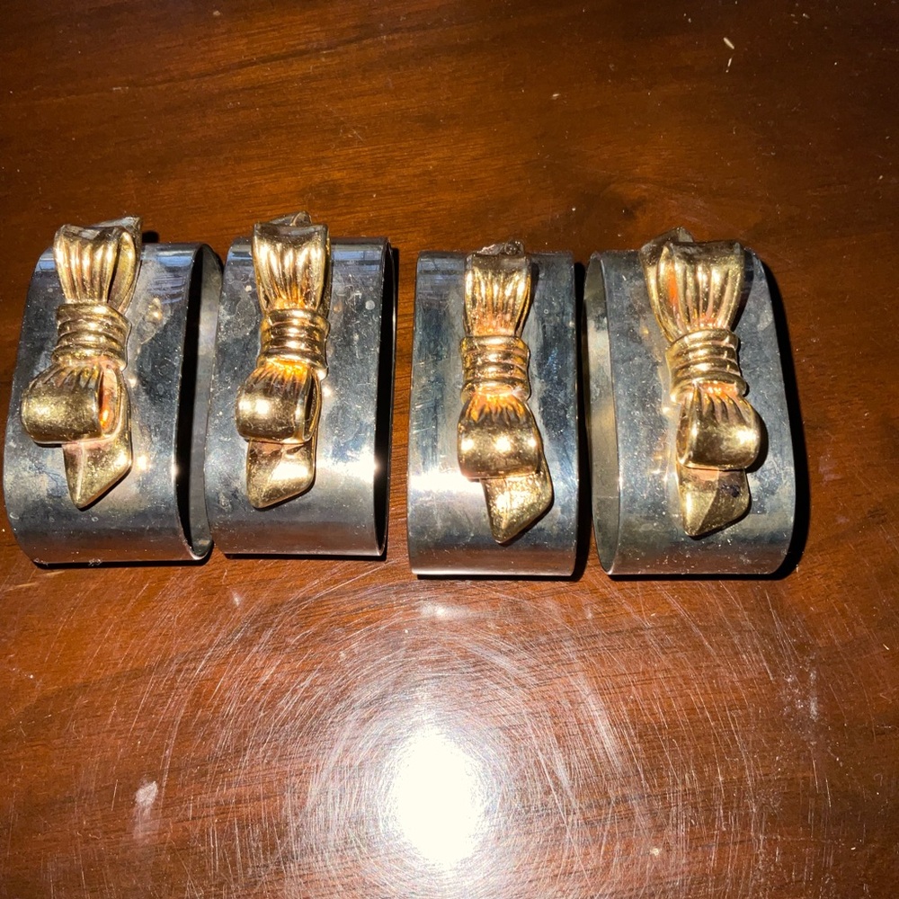 Set of Four Napkin Rings with Gold Bow Accent